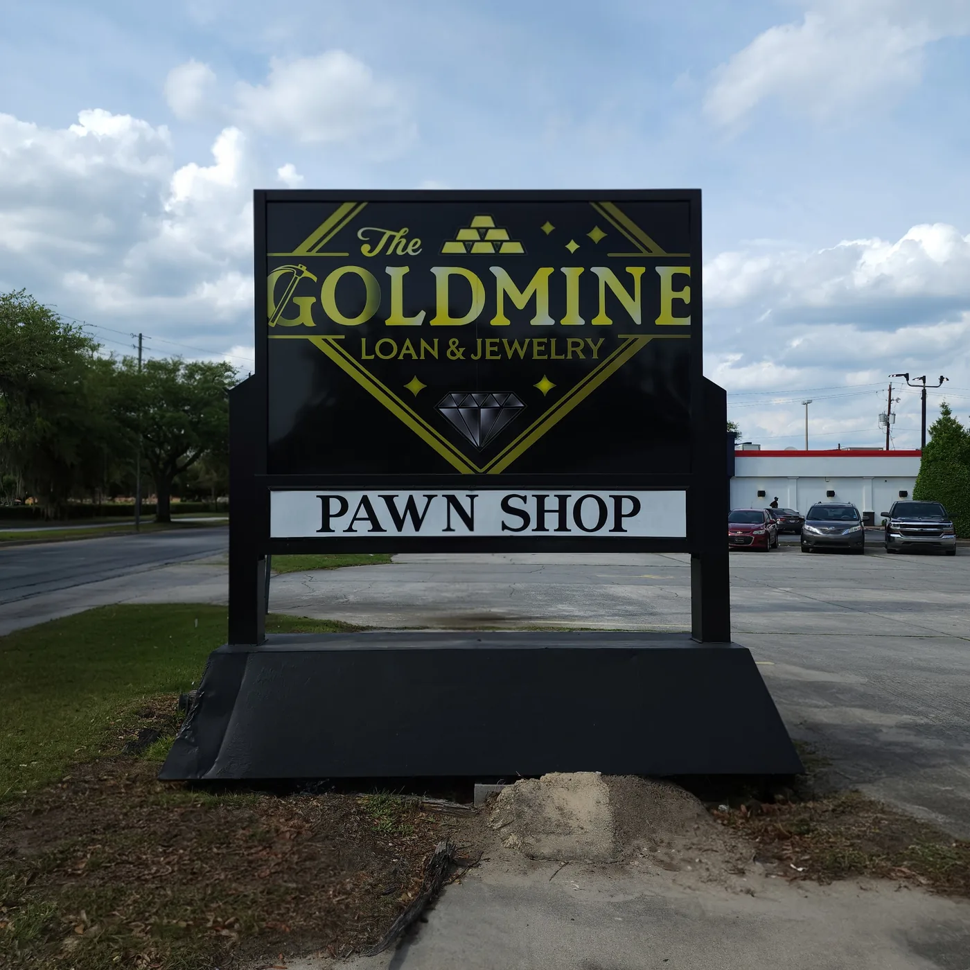 Gold Mine Loan & Jewelry roadside sign at 8110 White Bluff Rd # A, Savannah, GA